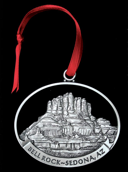 Bell rock medal with Buddha model in it