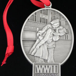 WWII, the national WWII museum locket with a couple kissing image