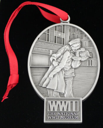 WWII, the national WWII museum locket with a couple kissing image