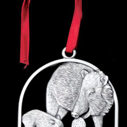 A locket with two pigs together design