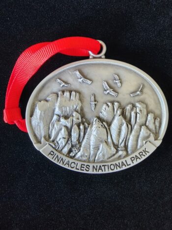 Pinnacles national park locket with a red ribbon