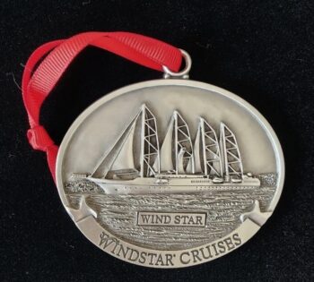 Wind star cruises locket with a ship design